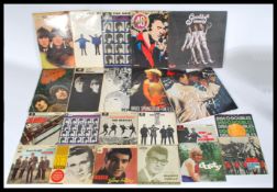 VINYL RECORDS - A collection of vinyl 7