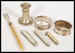 A group of silver hallmarked and other items to include three fruit pen knives, napkin rings, pepper