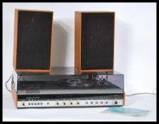 A vintage 1970's Fidelity Studio 6 teak cased and smoked perspex housing, consisting radio, tape and