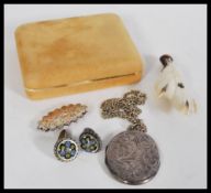 A group of sterling silver jewellery to include a Scottish kilt brooch with carnelian top. a