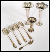 A silver hallmarked trumpet vase along with a pair of silver plated Mappin and Webb hammered trumpet