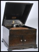 An early 20th Century Edwardian Academy oak cased