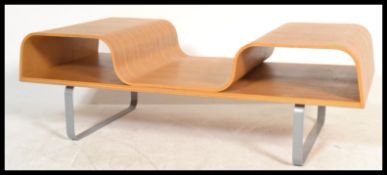 A retro 20th century veneered bentwood coffee table having sloped centre with raised sides and