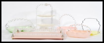 A vintage retro mid 20th Art Deco style century plastic patisserie service to include a circular