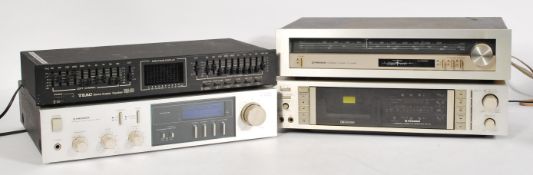 A vintage retro 20th century Pioneer music stacking system including tape cassette deck, Tuner