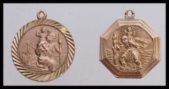 Two hallmarked 9ct St Christopher's pendants on necklace bale hoops. One of circular form and the