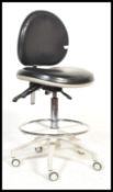 A good contemporary medical / Industrial surgeons stool being gas operated with 5 point castor