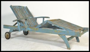 A fantastic vintage retro 20th century pool lounger day bed of slatted cedar wood construction