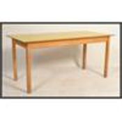 A large rare sized 1950's beach wood dining table