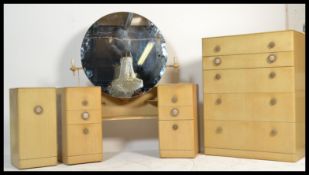 A vintage / retro 20th Century Art Deco bedroom suite comprising of a drop centre dressing table,