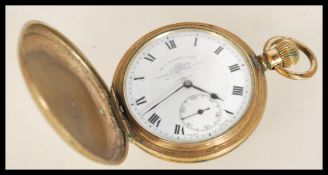 A vintage 20th century gold plated full hunter pocket watch by Tho Russell and Son Liverpool