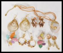 A collection of Joan Rivers collection jewellery including a 925 silver inset agate stone pendant, a