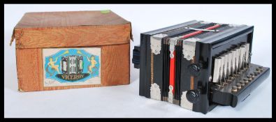 A vintage retro 20th century accordion musical instrument complete in box. Please see images.