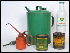 A group of vintage retro 20th century Industrial motoring oil advertising point of sale bottles