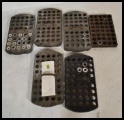 A group of six vintage early 20th century rare schoolroom inkwell carriers / trays having bakelite