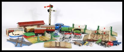 A collection of 20th century vintage toys to include a boxed penguin plastic high speed cruiser, a