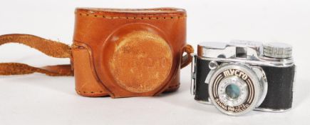 A vintage 20th century miniature micro camera by Mycro complete in case. Measures: 4cm high x 6cm