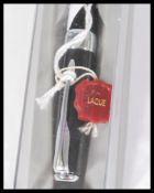 A pair of Parker 18ct gold nibbed fountain writing pens, both in their original boxes with arrow