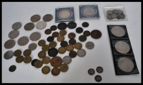 A collection of coins dating from the early 19th century to include Georgian coins and Victorian