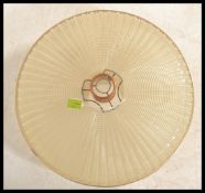 A pair of vintage retro ceiling lamps to include a 1960's style yellow rise and fall pendant lamp