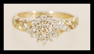 A hallmarked 9ct gold and diamond ring with twisted band detailing weighing 2.0 grams, ring size J.