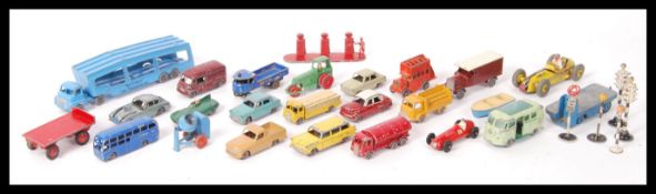 A group of vintage Matchbox Lesney diecast model cars to include car transporter etc. Along with