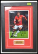 Football - Manchester United; an original autographed colour photograph of Manchester United