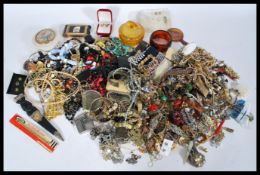 A collection of mixed costume jewellery to include a Scottish dirk with imitation elephant hair, a