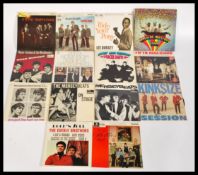 Vinyl Records - A collection of vintage  33rpm playing 7