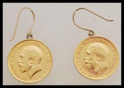 A pair of Edwardian half sovereign earrings. Total weight 8.2 grams.
