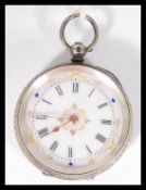 Three vintage watches to include two continental silver pocket watches and a small Tissot watch.