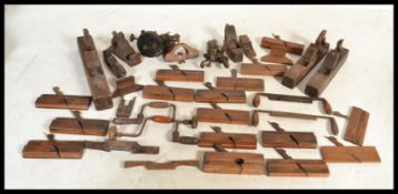 A good collection of vintage woodworking tools to include large wood plane, multiple smaller wood