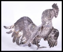 A vintage 20th century silver hallmarked large figurine of a fighting cockerel bearing London import