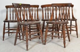 A set of 6 19th century Victorian Windsor elm and beech stick back dining chairs having solid elm