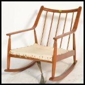 A mid century oak rocking chair - armchair by Scandart Furniture. Sleigh runners with shaped elbow