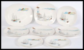 A group of four 20th century vintage plates Staffordshire china Cannes mid winter plates featuring