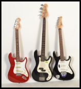 A group of three electric guitars to include two by Encore and one by Cort. Please see images.
