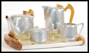 A vintage retro mid 20th century Picquot Ware coffee/ tea service made from stainless steel and