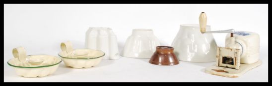 A collection of late 19th and early 20th Century Jelly moulds to include an example by Shelly