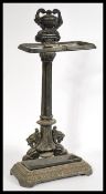 A 20th century cast iron stick stand in the manner of Coalbrookdale raised on a rectangular base