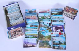An accumulation of vintage 20th century postcards of small size, mostly views of the United