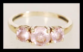 A 14ct gold hallmarked Birmingham ring with inset QVC diamonique pink stones in prong settings