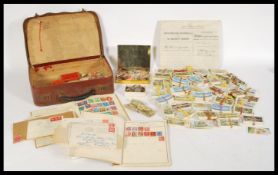 A collection of vintage stamps coins and cigarette cards to include unpublished sets etc. Please see