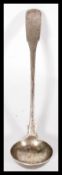 An early 19th century Georgian sauce ladle in the Fiddle pattern. Hallmarked for Glasgow 1821 makers