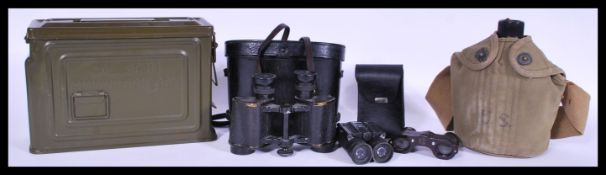 A group of vintage military related items to include a Ammunition case, water bottle and a cased