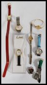 A collection of vintage watches to include Limit, Rotary, Citron, Sekonda, Montine, etc. Please