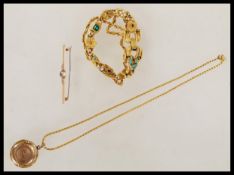 A collection of vintage jewellry to include retro yellow metal bracelet with gemstone and floral