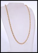 A 20th century vintage rope chain 9ct gold necklace with a spring ring clasp. The length is