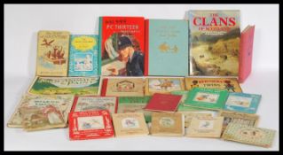 A collection of vintage 20th century books to include The Kentucky Twins, Here Comes Mumfie by