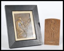 A pair of bronze Art Nouveau plaques circa 1900 one being framed, featuring embossed antiquity